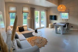 Stijlvol huisje met veranda! Tuynloodz C