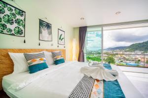 Patong Villa1三卧泳池别墅两个海景房 近班赞江西冷海滩中文管家