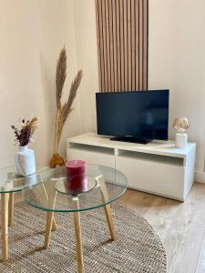 Appartements L’evasion - Studio cosy en centre ville : photos des chambres