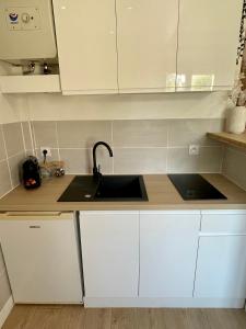 Appartements L’evasion - Studio cosy en centre ville : photos des chambres