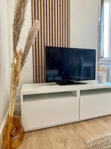 Appartements L’evasion - Studio cosy en centre ville : photos des chambres