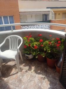 AL LADITO DE LA PLAYA