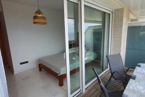 Ático con gran terraza y vistas al mar