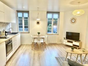 Appartements Le Ptit Bouchon - Lumineux et Calme proche commerces : photos des chambres