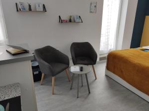 Appartements VITTEL LOC'S - Le 6, calme avec terrasse privative : photos des chambres
