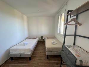 Villas Bas de villa Climatise et wifi 2 chambre pour 4 personnes et petite vue mer : photos des chambres