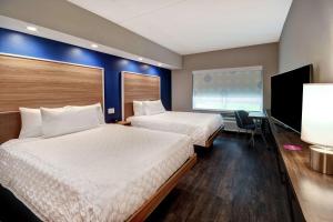 Queen Room with Two Queen Beds room in Tru By Hilton Raleigh Durham Airport