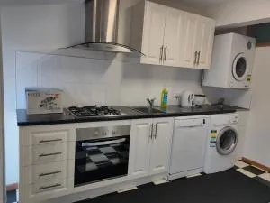 DingDing's downst-airs yellow House - Coningham