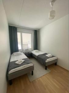 Kotimaailma - Kaunis tilava kolmio saunalla Helsingissä