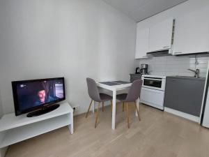 Best location studio in town right next to the train station and free parking Kotimaailma Apartments