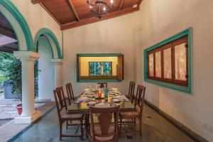 SaffronStays Aquamarina - 3BR Mediterranean style beachfront villa with pool, lawns & seafood dining near Nagaon Beach