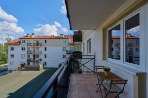 Peaceful Wrocław Apartment for 4 Guests with Balcony by Renters