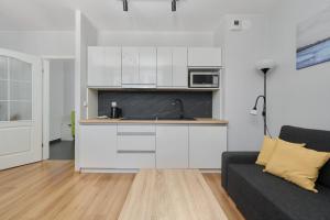 Peaceful Wrocław Apartment for 4 Guests with Balcony by Noclegi Renters