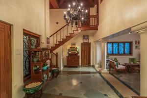 SaffronStays Aquamarina - 3BR Mediterranean style beachfront villa with pool, lawns & seafood dining near Nagaon Beach