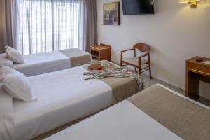 Twin Room with Extra Bed and Balcony (2 Adults + 1 Child) room in GHT Oasis Park & Spa