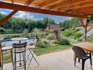 Maisons de vacances Piscine et Jacuzzi en Pleine Nature a 5 minutes de Sarlat : photos des chambres