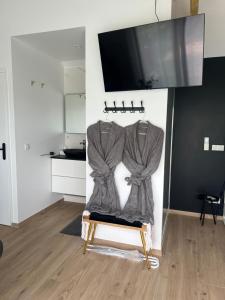 Appartements Suite romantique avec Spa et filet suspendu : photos des chambres