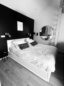 Appartements Suite romantique avec Spa et filet suspendu : photos des chambres