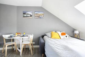 Appartements La Hague - Cosy - Bord de mer - Bien equipe - Stationnement facile & gratuit : photos des chambres