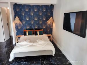 Appartements Studio avec jaccuzzi : photos des chambres