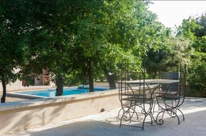 Maisons de vacances Gite neuf avec piscine Bio uv : photos des chambres