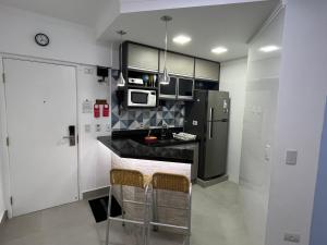 FLAT NA RIVIERA COM VISTA MAR A 150m DA PRAIA NO MÓDULO 06 !