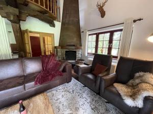 Ardennes villa with riverside garden and views