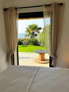 Villas Luxury beach front Villa & Private garden : photos des chambres