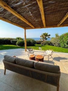 Villas Luxury beach front Villa & Private garden : photos des chambres