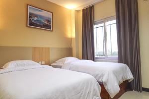 Phòng Hai Giường Đơn Loại Sang (Deluxe Twin Room)