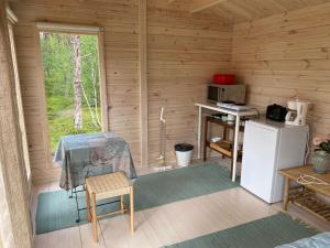 Chalet room in Lemmenjoen Lumo - Nature Experience & Accommodation
