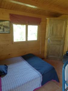 Chalets petit chalet dans verger et village Historique : photos des chambres