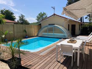 Villas !Villa 4*MiMiZaN/Piscine chauffee/Wifi/Plage a 5mn/Clim : photos des chambres