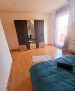 Appartements Logement La Bonbonniere garage et parking gratuit : photos des chambres