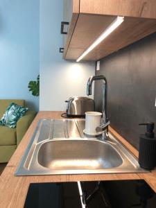 Appartements WelkHome Inn Best Suites - Spa : photos des chambres