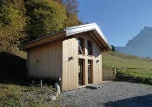 Chalets Chalet*** au pied d'une prairie face a la montagne : photos des chambres