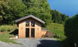 Chalets Chalet*** au pied d'une prairie face a la montagne : photos des chambres