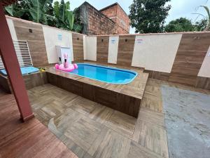 Casa iguaba com área de lazer