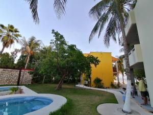 Marysol D8 beachfront next to nomads