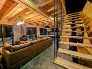 Chalets La fleche 1 de Super Besse - Chalet Prive de Standing avec Jaccuzzi : photos des chambres