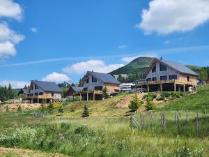 Chalets La fleche 1 de Super Besse - Chalet Prive de Standing avec Jaccuzzi : photos des chambres