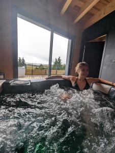 Chalets La fleche 1 de Super Besse - Chalet Prive de Standing avec Jaccuzzi : photos des chambres