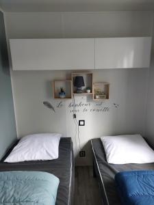 Campings Mobil-home La perle bleue : photos des chambres