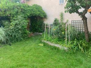 Sejours chez l'habitant Chambre cosy a Houilles : Chambre Double