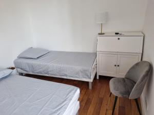 Appartements Face chateau St Germain en Laye, appartement 4 a 6 personnes, 23 min de Paris Champs-Elysees : photos des chambres