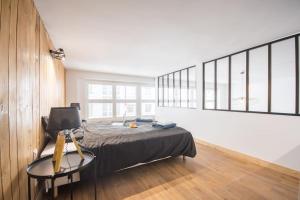 Appartements L'appar-T, esprit industriel a 2 pas de l'eau ! : photos des chambres