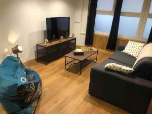 Appartements L'appar-T, esprit industriel a 2 pas de l'eau ! : photos des chambres