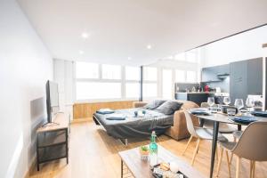 Appartements L'appar-T, esprit industriel a 2 pas de l'eau ! : photos des chambres