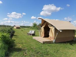 Tentes de luxe FERME DU CAROIRE : photos des chambres