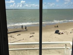 Appartements Beach apartment - Ocean sunset full view : photos des chambres